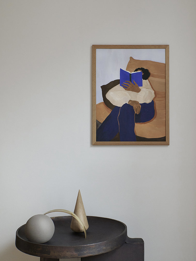 A lifestyle photo of the art print The Togo by Hanna Peterson in a Scandinavian interior.