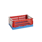 Side-angle view of the small HAY Colour Crate in a vibrant mix red, showcasing its stackable, ventilated industrial design made from recycled plastic.