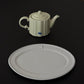 Studio M' Pungency Teapot paired with Studio M' White Malta Oval Plate.