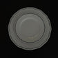 Tuxton Charleston round dinner plate in American White with embossed scalloped edges, available in two sizes. 