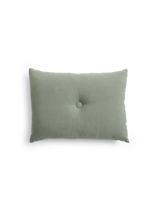 HAY Dot Cushion in deep pine green with covered center button on white background