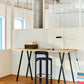 Modern office setup with Hay Apex desk lamp in Emerald Green on a wooden desk.