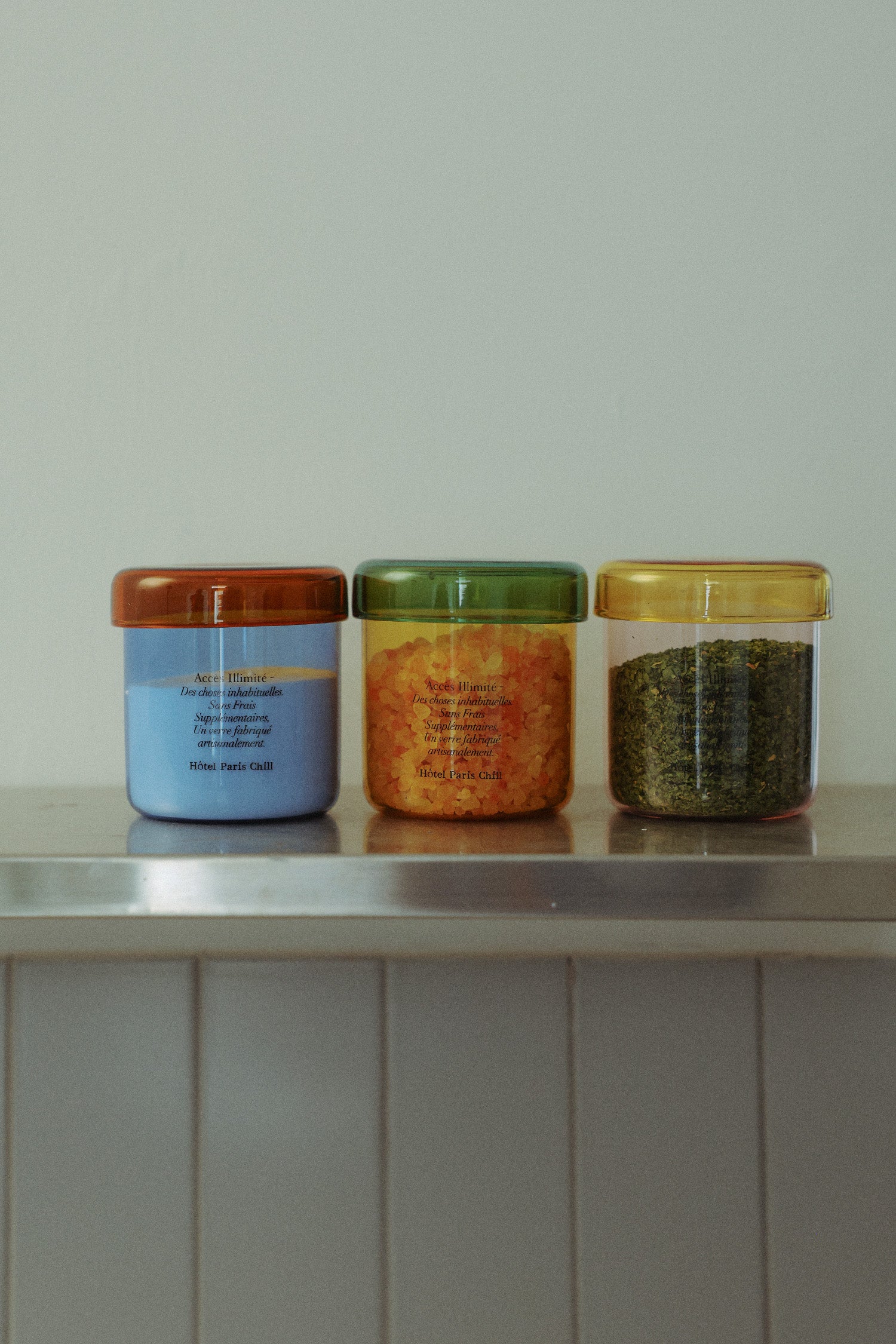HÔTEL827 glass storage jars on kitchen bench-top, storing ingredients.