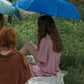 Woman Holding with HÔTEL827 Midnight Overhaze dual use sun and rain umbrella