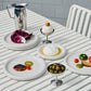 Table setting with a variety of Hay Barro tableware in off-white. 