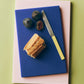 HAY large Slice chopping boards with chopped vegetables and table knife on modern kitchen counter