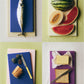Flat lay of Hay slice chopping boards with different kind of food.