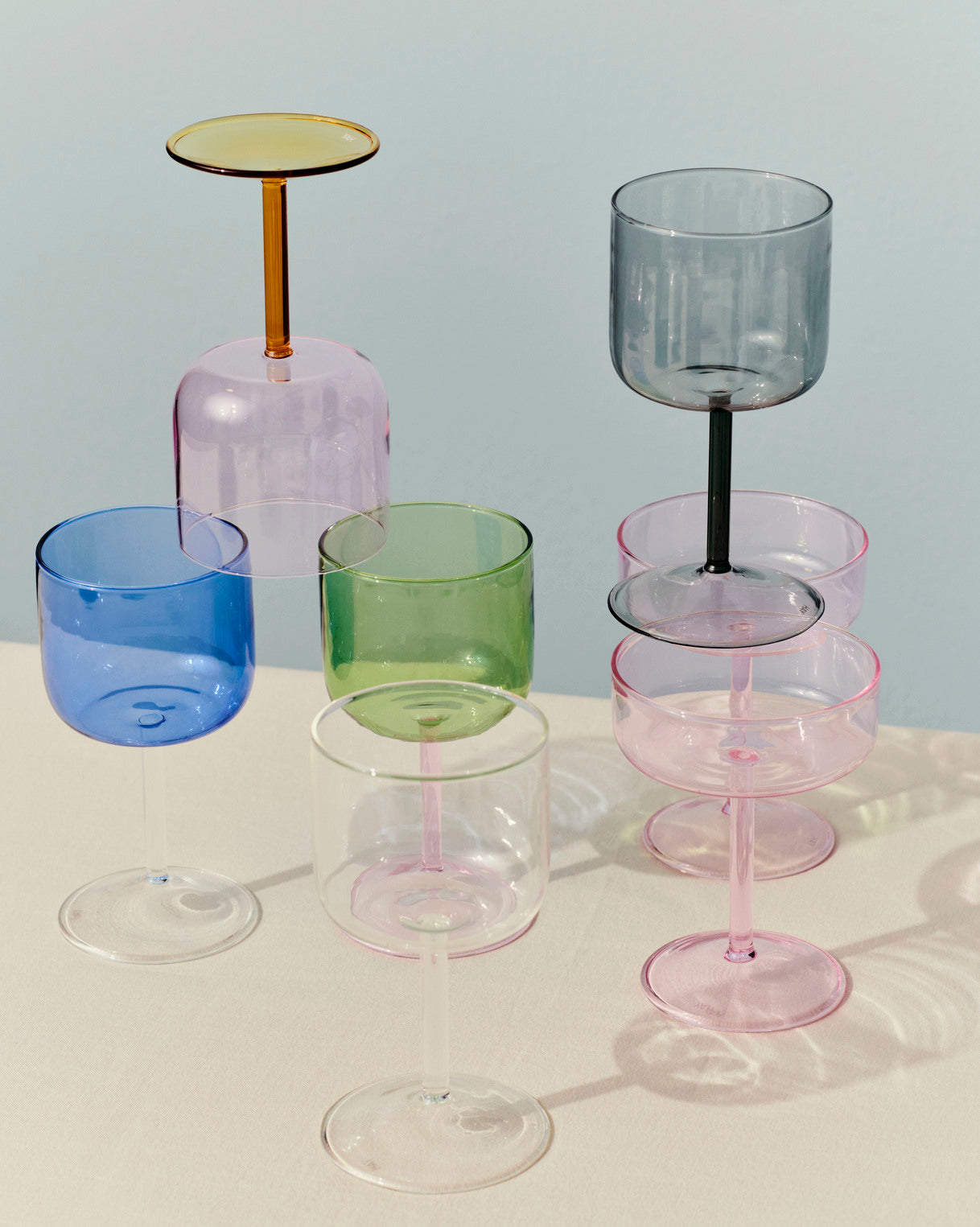 A shot of set of two HAY Tint Wine Glasses, available in different colours.
