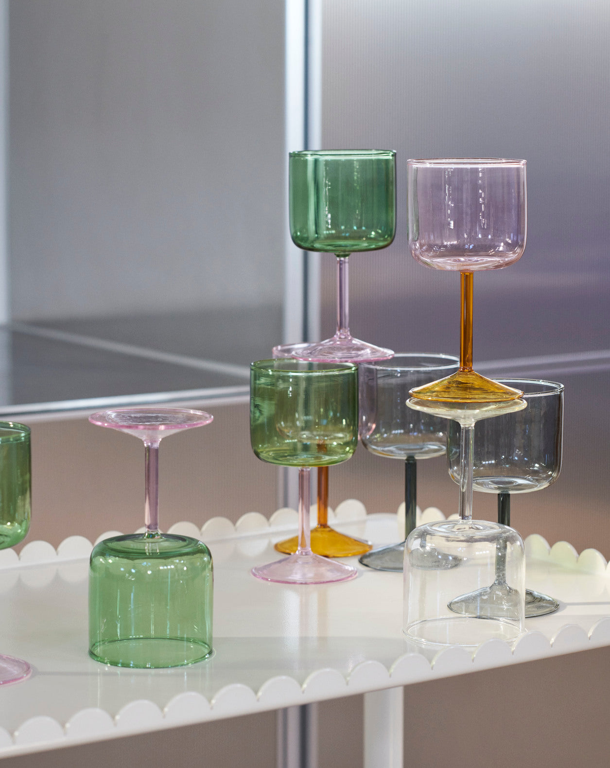 A shot of set of two HAY Tint Wine Glasses, available in different colour combination.