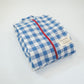 A side view of medium Hotel827 cotton travel pouch in Ripples. 