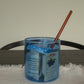 HÔTEL827 blue glass storage jar on dining table storing butters. 