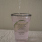 Iced drink served in HÔTEL827 Sun Kissed blush pink glass tumbler on styled dining table