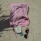 HÔTEL827 Sun Kissed pink canvas tote bag on the sand.