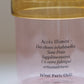 Close-up of HÔTEL827 pink glass storage jar
