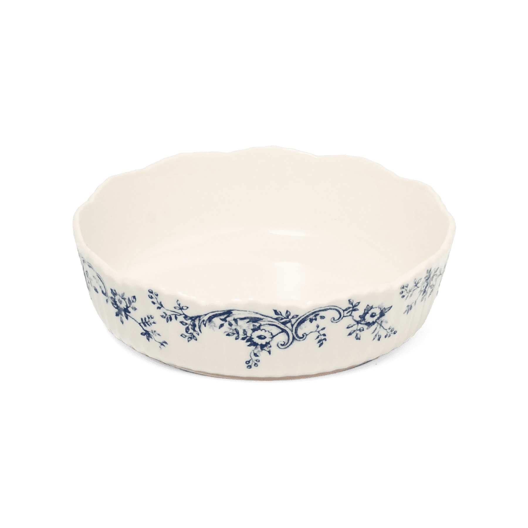 A pack shot of Studio M' Audrey Cake Pan in indigo colour, featuring a scalloped lace-like rim and an English garden-inspired floral relief pattern.