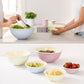 A lifestyle shot of Riess enamel bowls used for prepping meals.