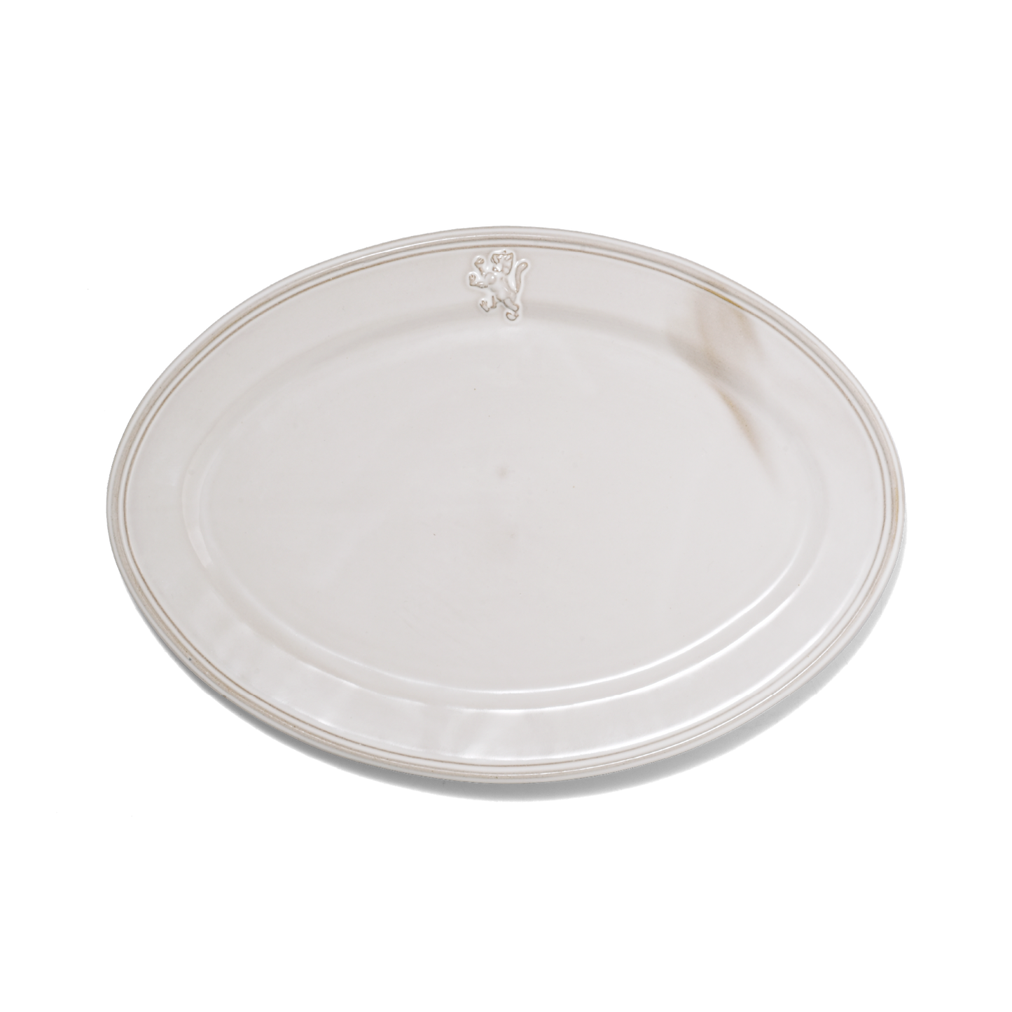 A pack shot of Studio M' Malta Oval Plate 28cm in a stunning white glaze, featuring a sleek, almond-like oval shape and an embossed vintage-style cat crest on the rim.