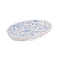A pack shot of Studio M' Chamomile Oval Plate from a side angle.