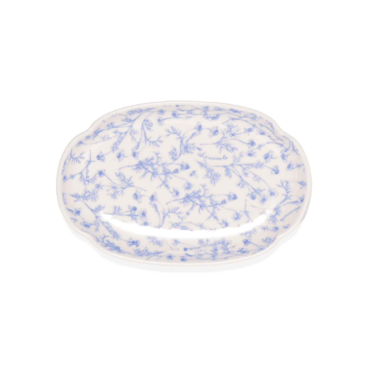 A pack shot of Studio M' Chamomile Oval Plate in white porcelain, featuring a vintage blue floral pattern and a gently curved traditional Japanese Mokkou shape.