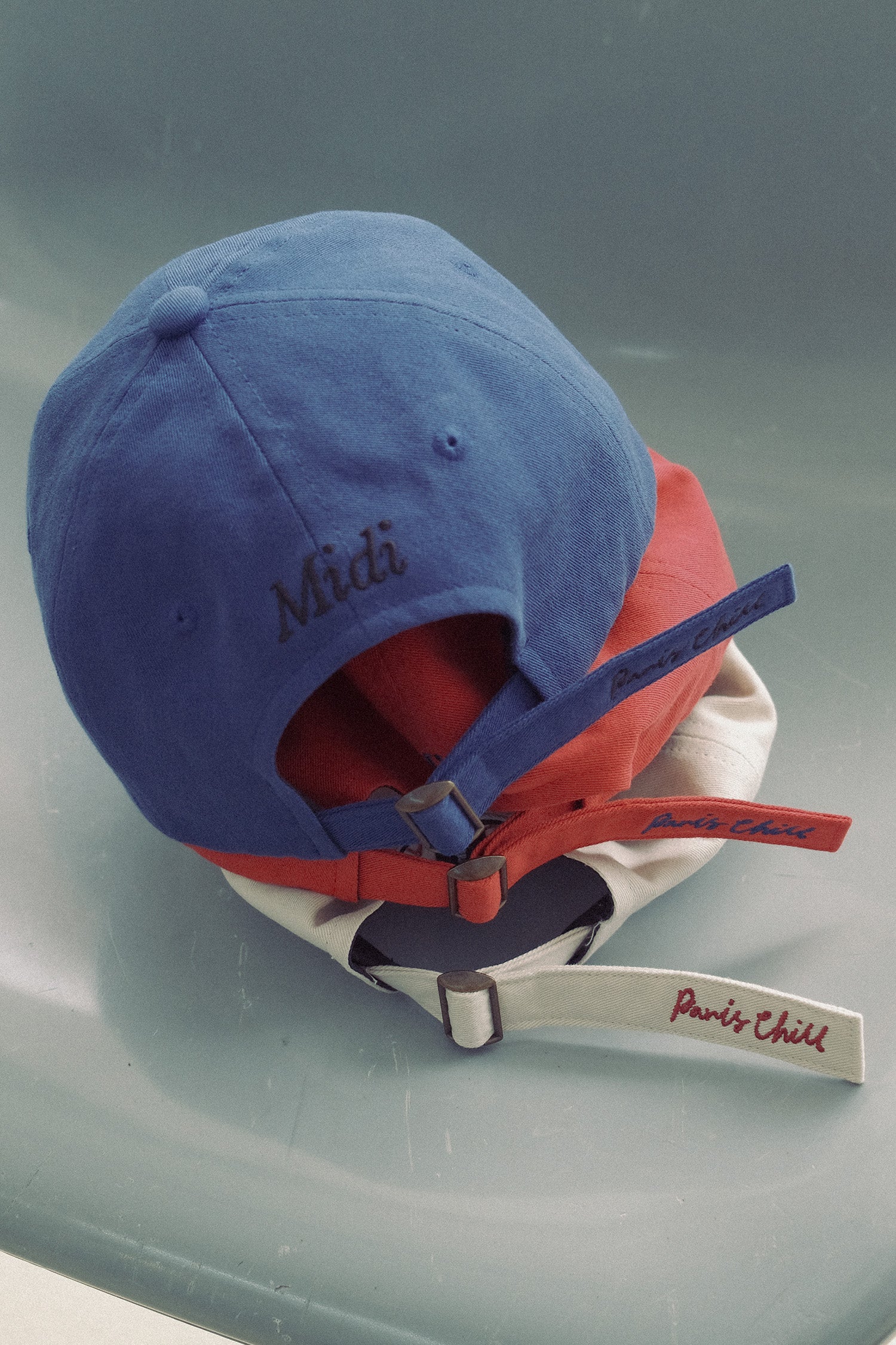 Back view of the stacked Hotel827 Sun Kissed baseball cap in different colours. 