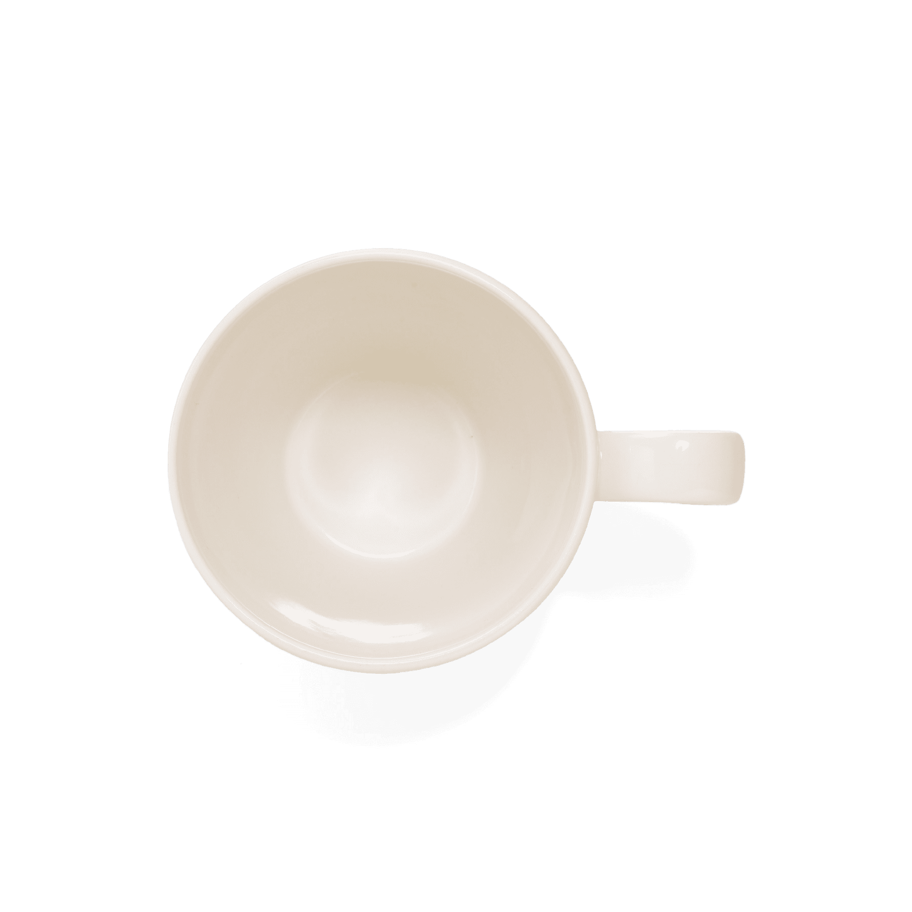 An aerial shot of Studio M' Creamware Latte Mug in a warm cream ceramic glaze.