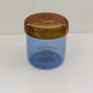 Aerial view of HÔTEL827 Overhaze Blue mouth blown borosilicate glass jar container with lid