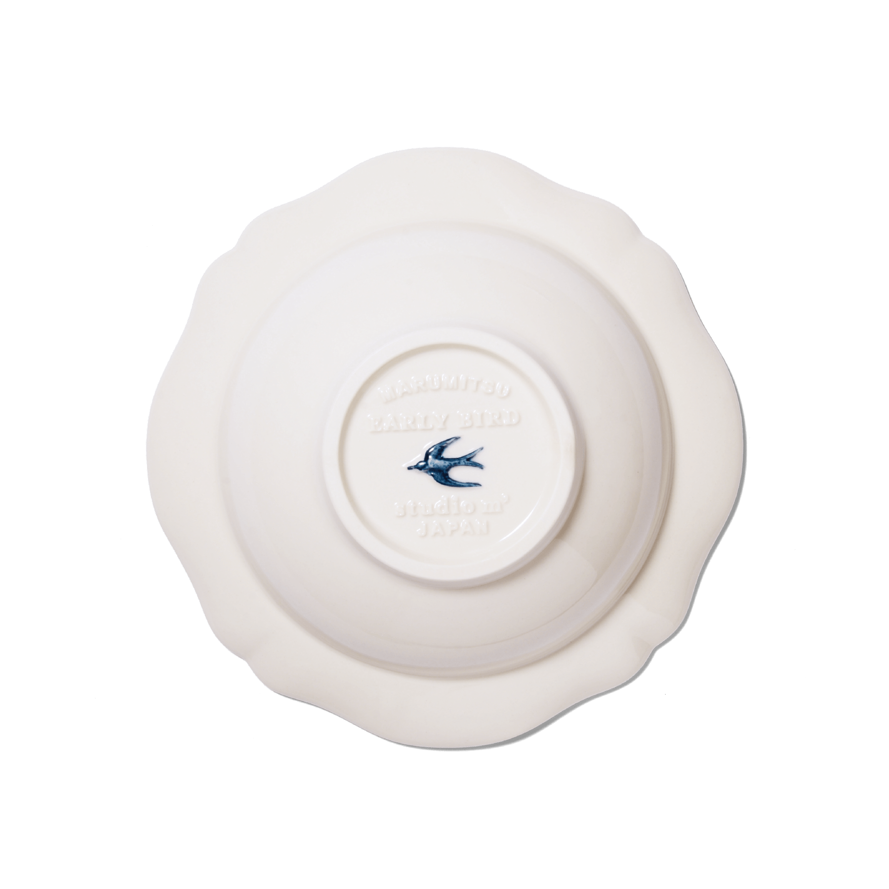 A picture of the base of Studio M' Early Bird 170 porcelain bowl featuring a hand-painted blue swallow relief on a scalloped floral rim.