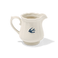 A side view of Studio M Early Bird small creamer.