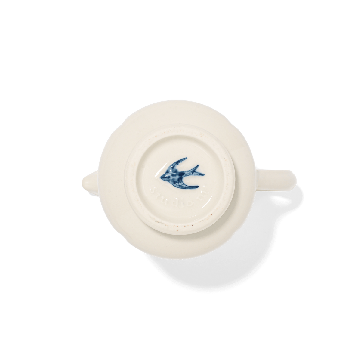 A pack shot of the base of Studio M Early Bird small creamer.