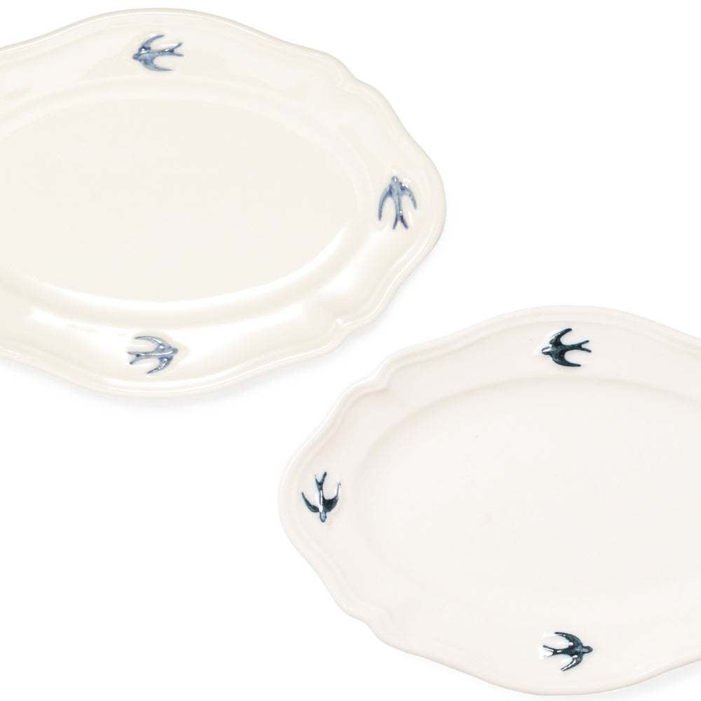 A pack shot of two Studio M' Early Bird Oval Plates in L. 