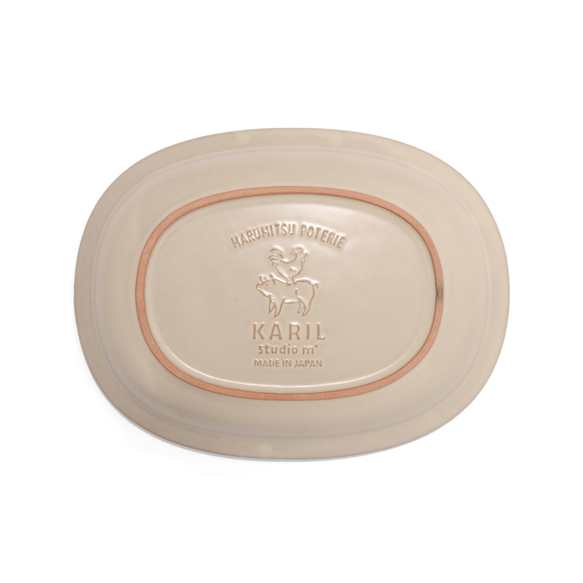 The base of Studio M Karil 25cm oval earthenware plates in ecru colour.