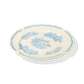 A side view of Studio M' La Paix Rose dessert plate.