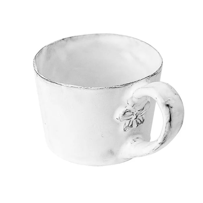 Carron Paris ceramic mug with a signature small embossed knot for coffee and tea.