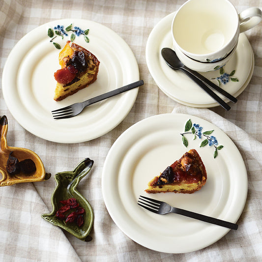Studio M' Myrtille Dessert Plate in warm cream ceramic, in an afternoon tea table setting.