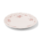 A pack shot of Studio M' Moment Plate 24cm in pink glaze, from a side angle.
