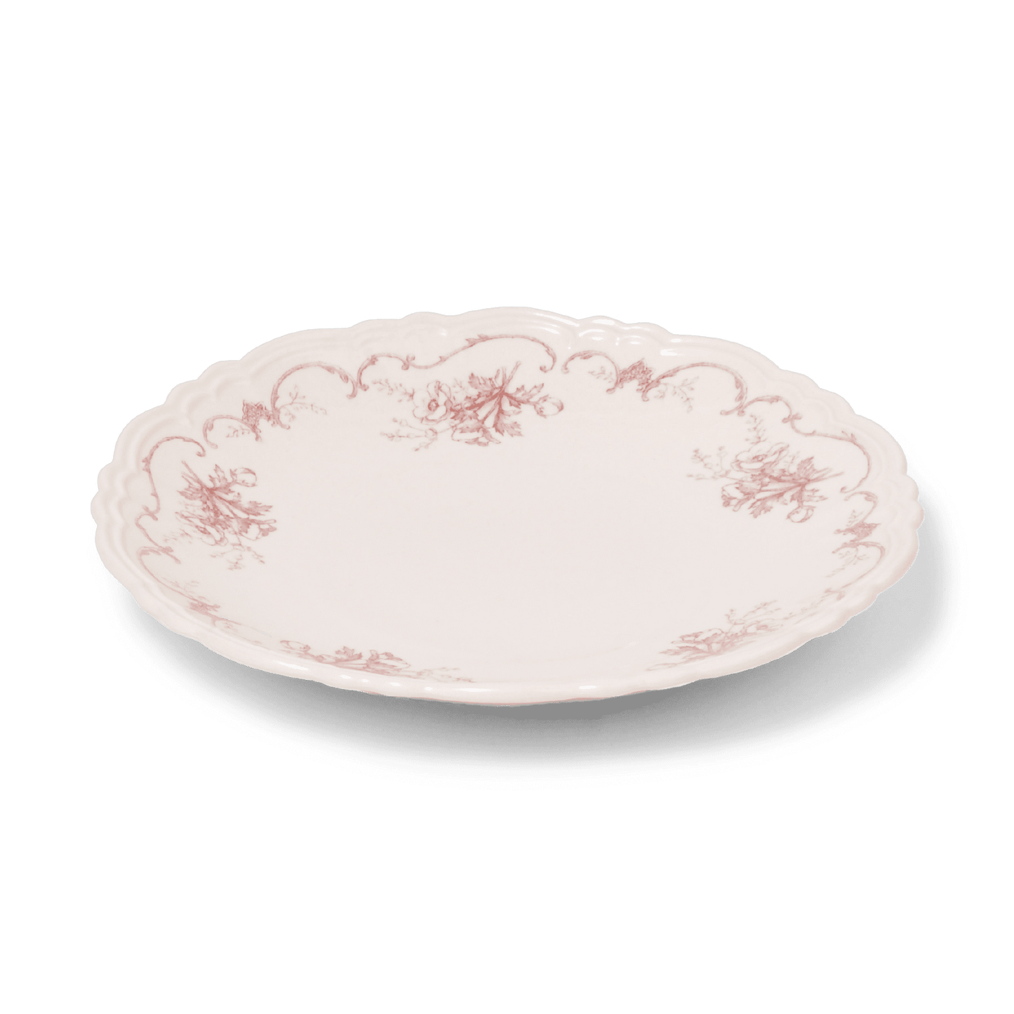 A pack shot of Studio M' Moment Plate 24cm in pink glaze, from a side angle.