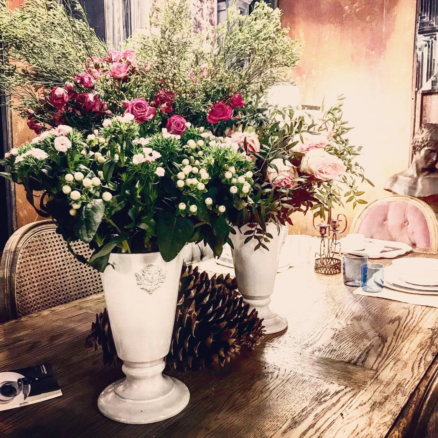 Carron Paris ceramic footed vase with a sculpted embossed face for flowers or decor.