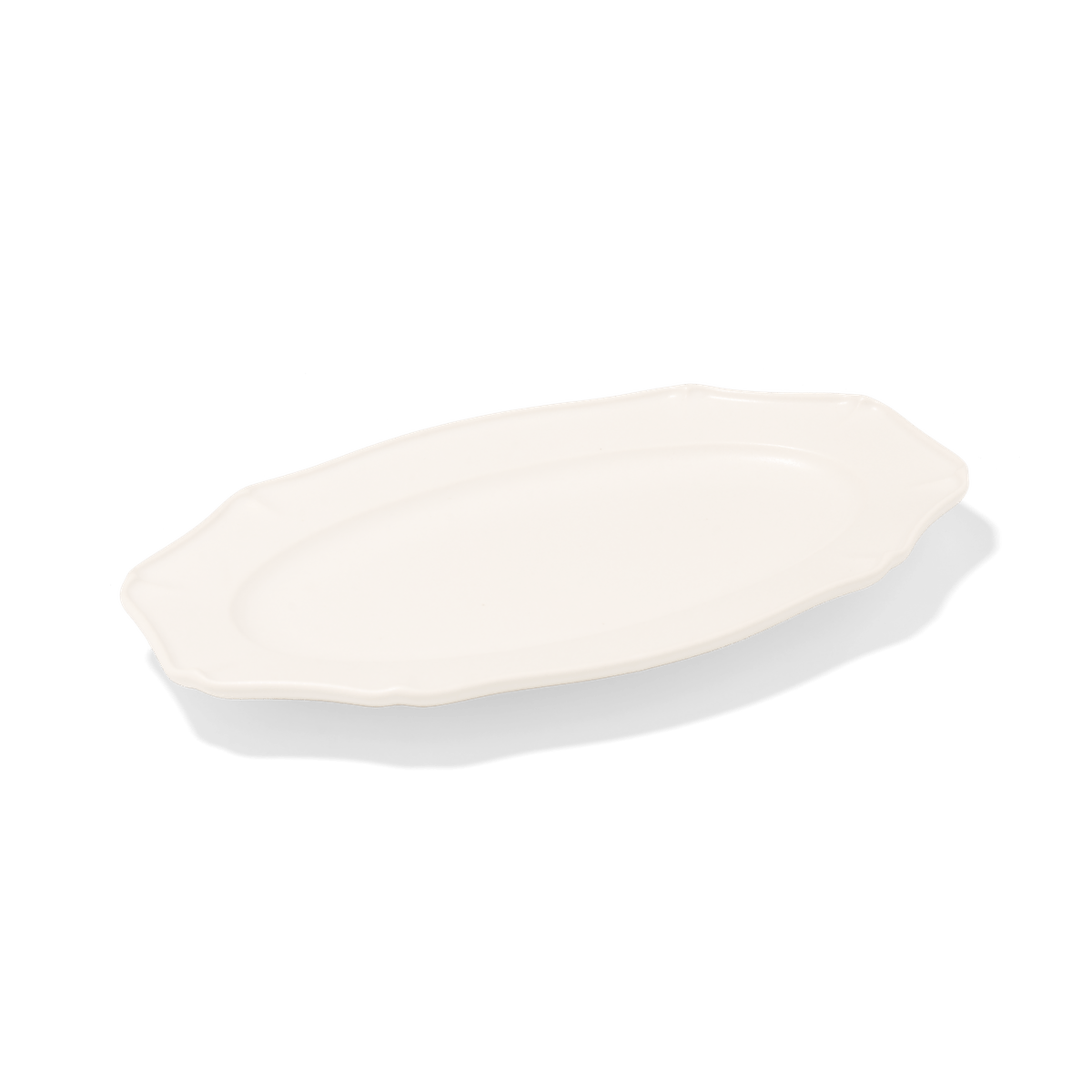 Side view of Studio M Ornata matte white 20cm oval plate.