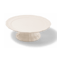 A pack shot of Studio M' Parler Compote 21cm in white porcelain, an elegant cake stand featuring a softly undulating plate and a dynamic, graceful pedestal.
