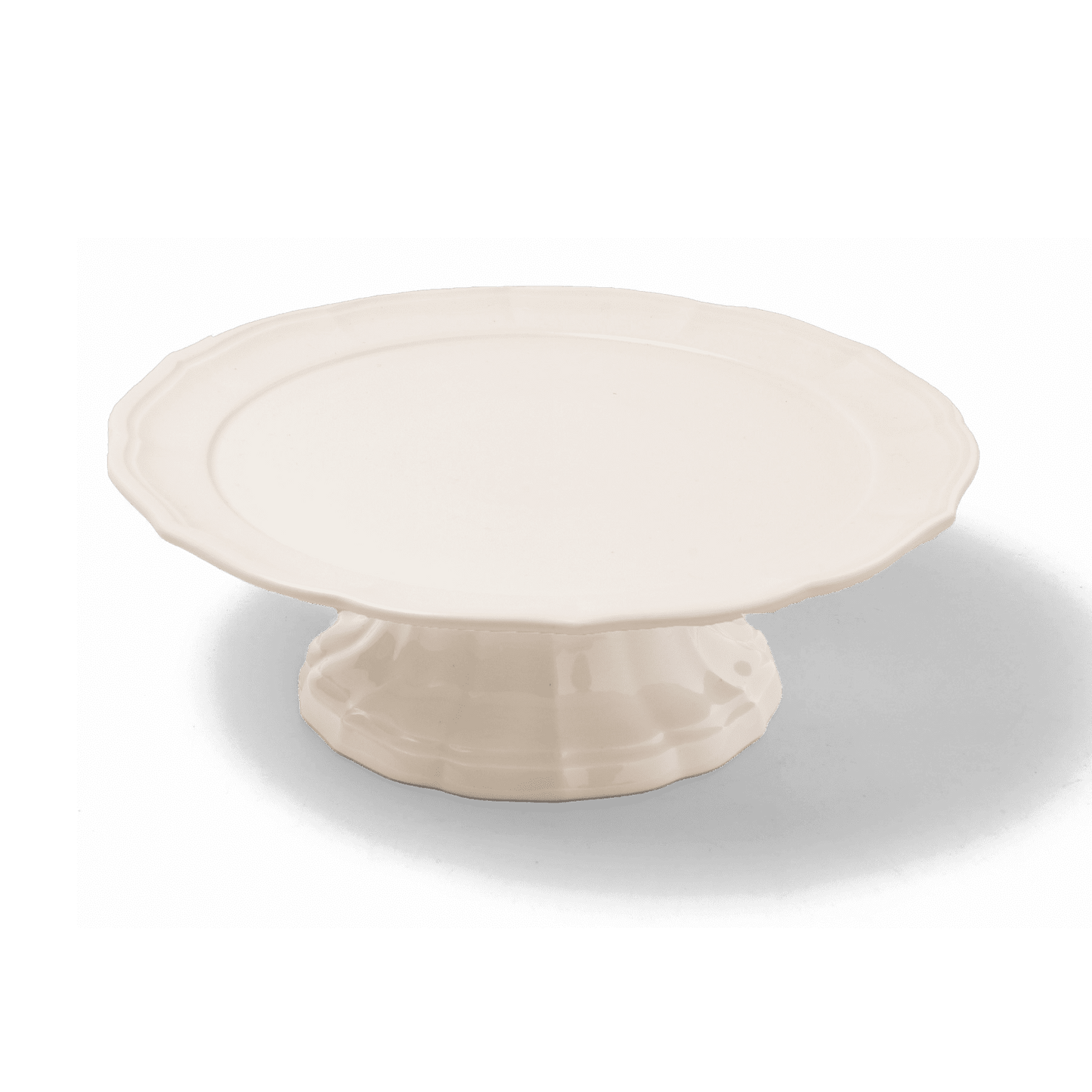 A pack shot of Studio M' Parler Compote 21cm in white porcelain, an elegant cake stand featuring a softly undulating plate and a dynamic, graceful pedestal.
