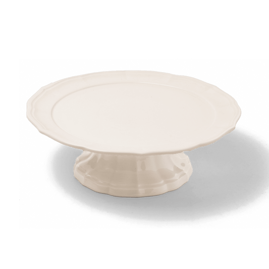 A pack shot of Studio M' Parler Compote 21cm in white porcelain, an elegant cake stand featuring a softly undulating plate and a dynamic, graceful pedestal.