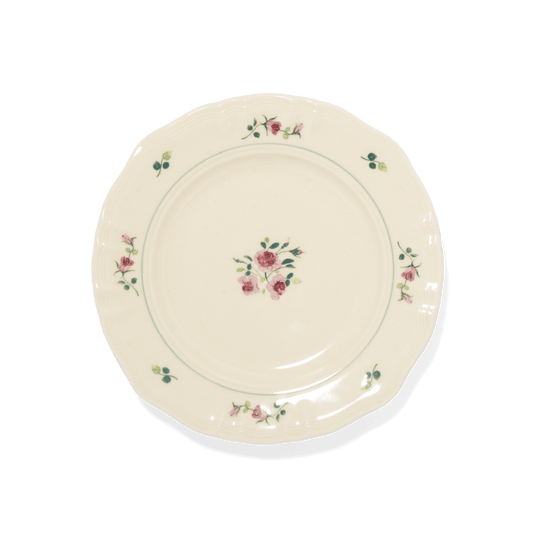 A pack shot of Studio M' Rosier Plate 16.5cm in a warm, subtle beige glaze, featuring a vintage-inspired red rose motif and an elegantly tiered, hand-painted rim.