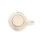 A pack shot of the base of Studio M' Rosier Mug in a warm, subtle beige glaze.