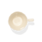 An aerial shot of Studio M' Rosier Mug in a warm, subtle beige glaze.