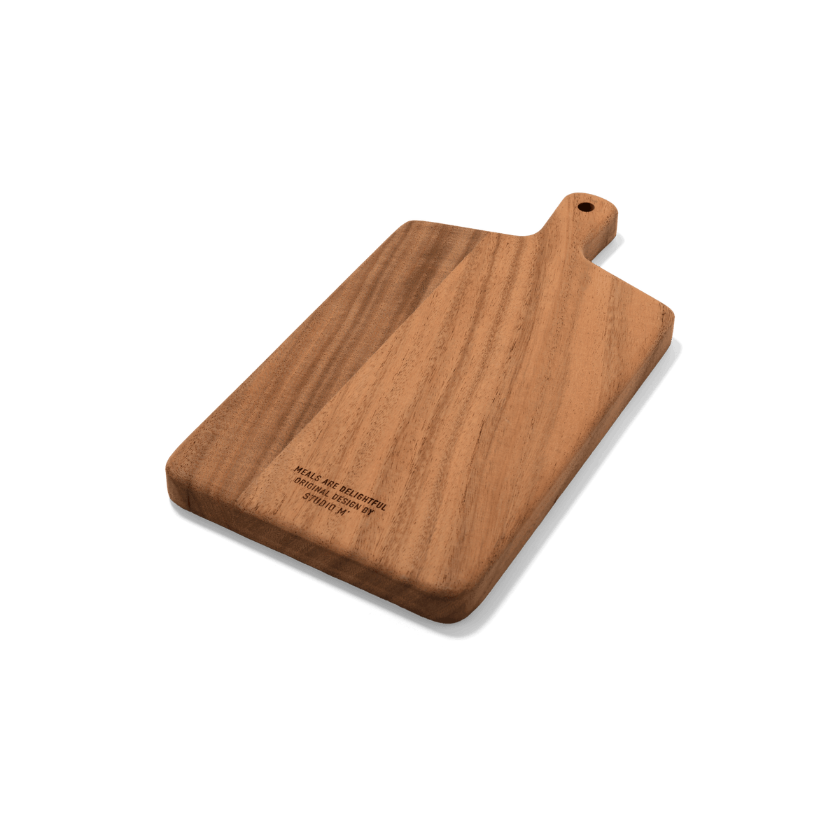 A side view of Studio M Japanese solid walnut cutting board in oblong